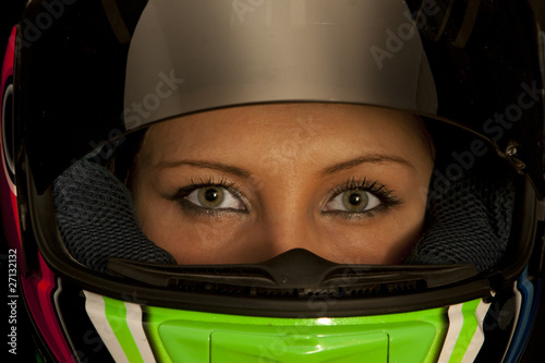 Female motorcycle driver with helmet on © 3rn3stino