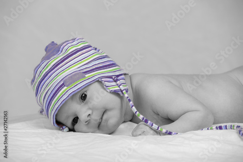 baby with blue cap