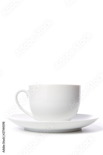 Coffee cup and grain on white background