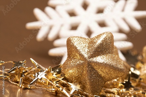 Christmas gold stars on the gold background