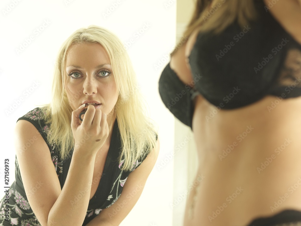 Obraz premium Young Women Getting Dressed. Models Released