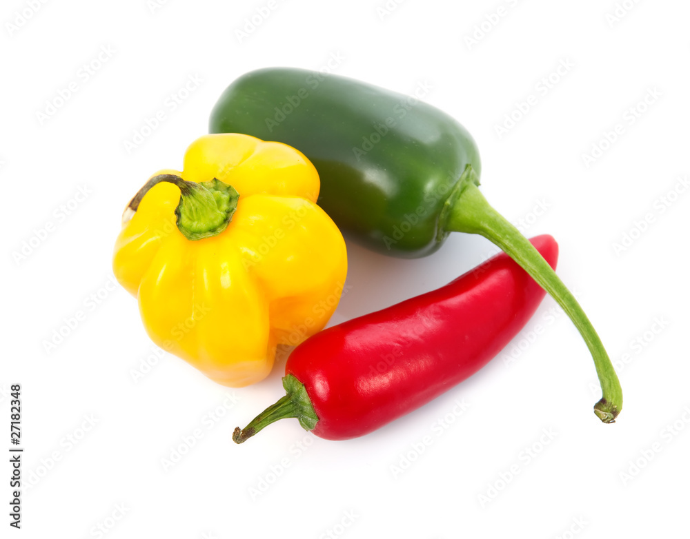 Three colored chili pepper vegetables isolated Three colored chili pepper vegetables isolated
