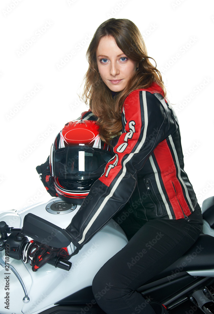 Sexy woman in a leather suit on motorcycle holding a helmet 素材庫相片| Adobe  Stock