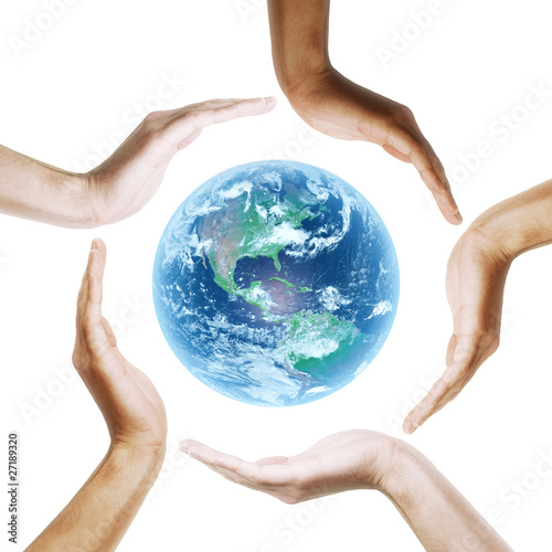 Fototapeta Naklejka Na Ścianę i Meble -  Earth with multiracial human hands. on white background.