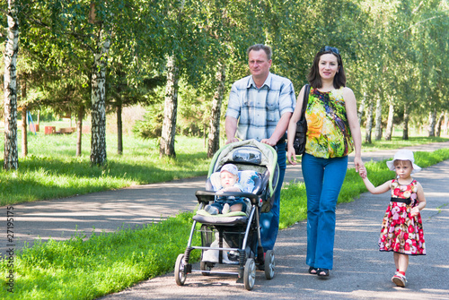 happy family walks in the park