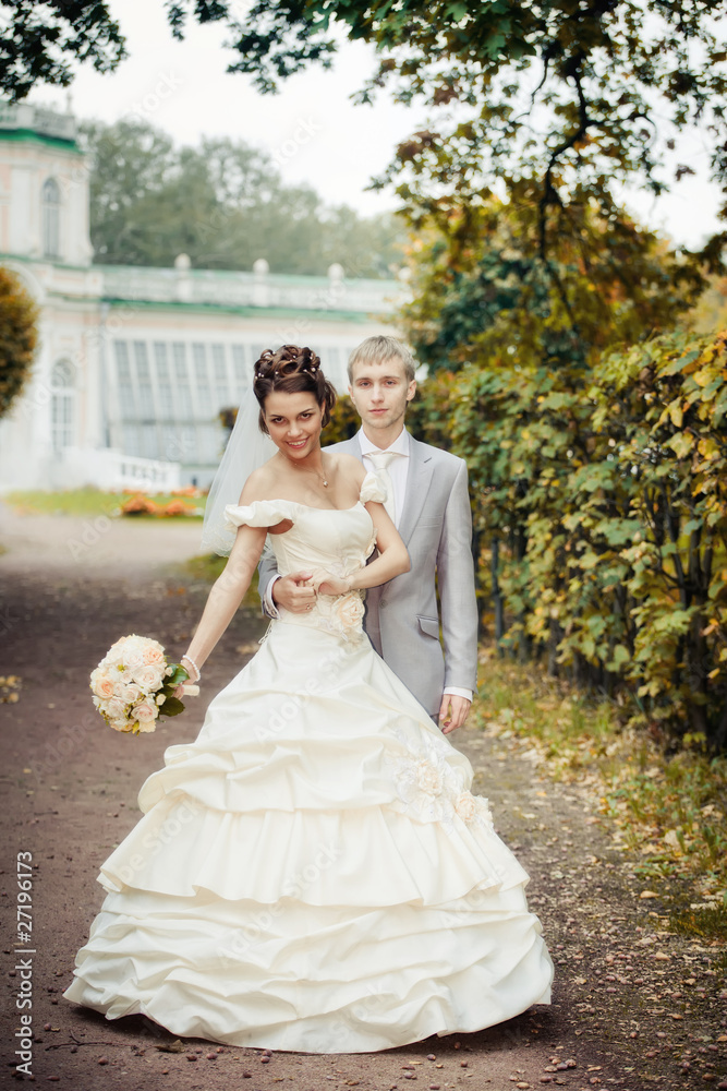 Portrait of newlyweds walking in moscow estate Portrait of newlyweds walking in moscow estate
