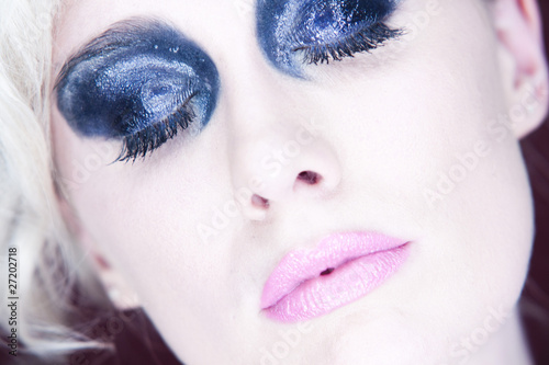 Woman with dark eye makeup