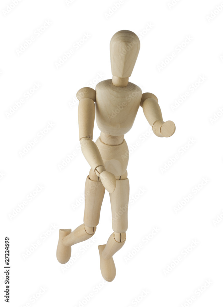 Wooden mannequin flies and stretches hands Wooden mannequin flies and stretches hands