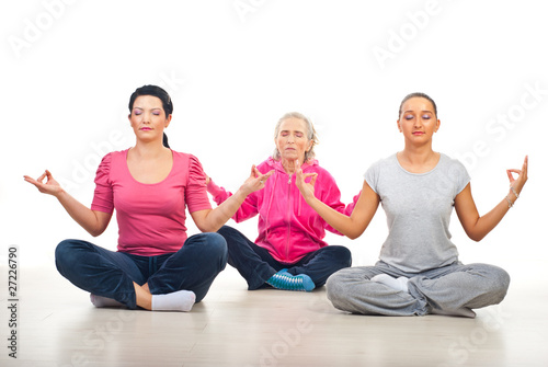 Group of women in yoga position