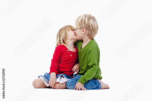 brother and sister kissing
