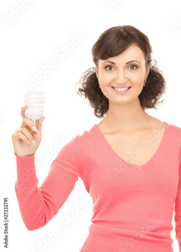 woman holding energy saving bulb © Syda Productions