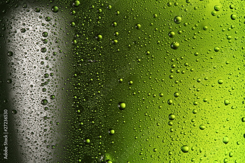 Texture of water drops on the bottle of beer. #27236530