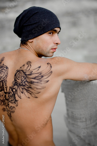 Obraz na płótnie Muscular Sexy Man with tattoo w salonie