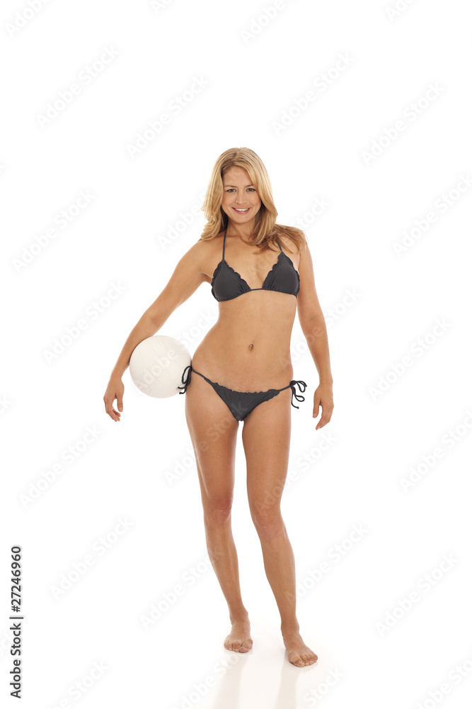 Woman holding volleyball