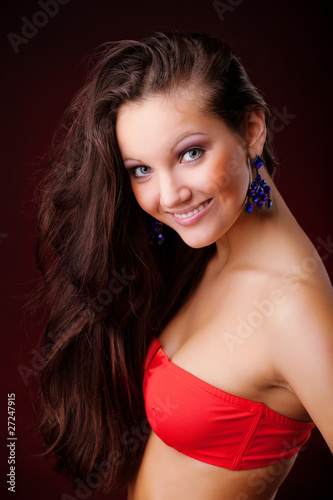 Sexy young woman in red lingerie