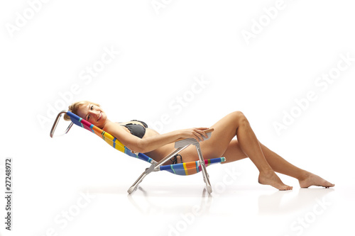 Woman relaxing in beach chair