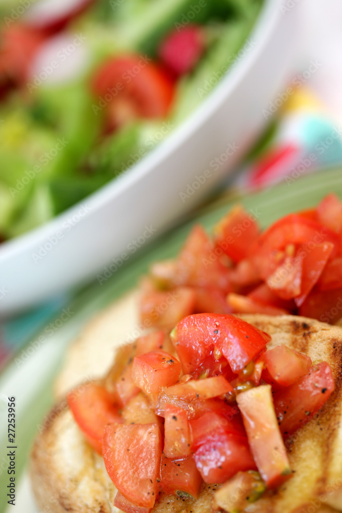 Chopped Tomatoes on Bruschetta Bread with Salad