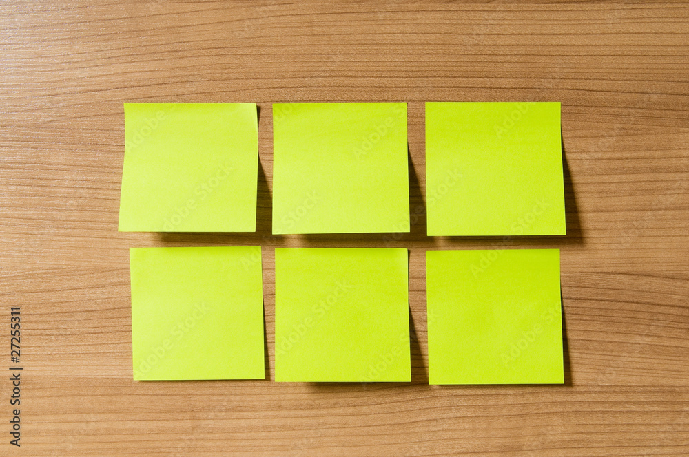 Fototapeta premium Many reminder notes on the wooden background