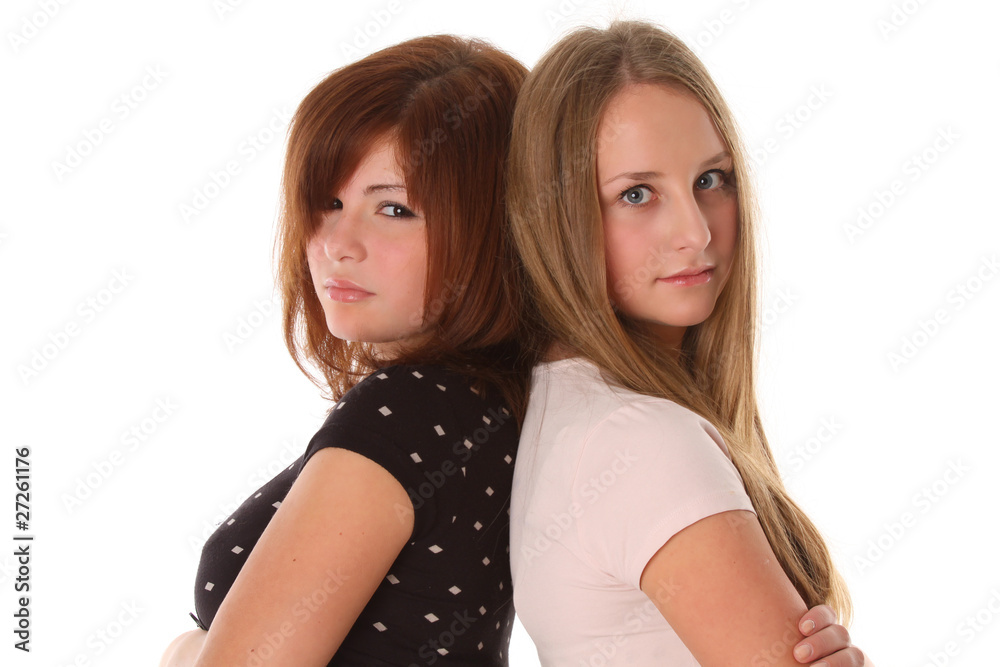 Young women friends - two fashion model. Face closeup Young women friends - two fashion model. Face closeup