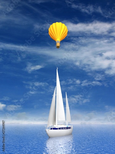 Sailing luxury yacht and flying balloon