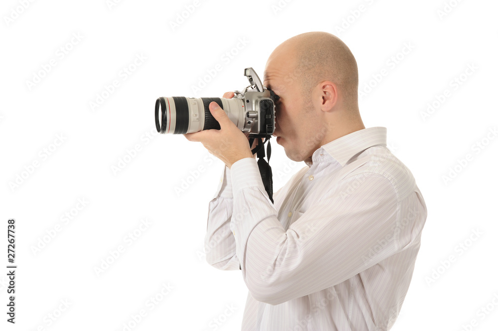 man holds a camera