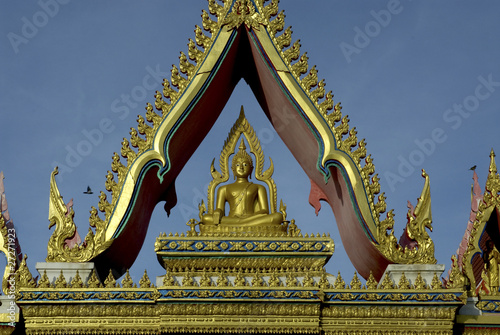 Buddha on top of the door photo