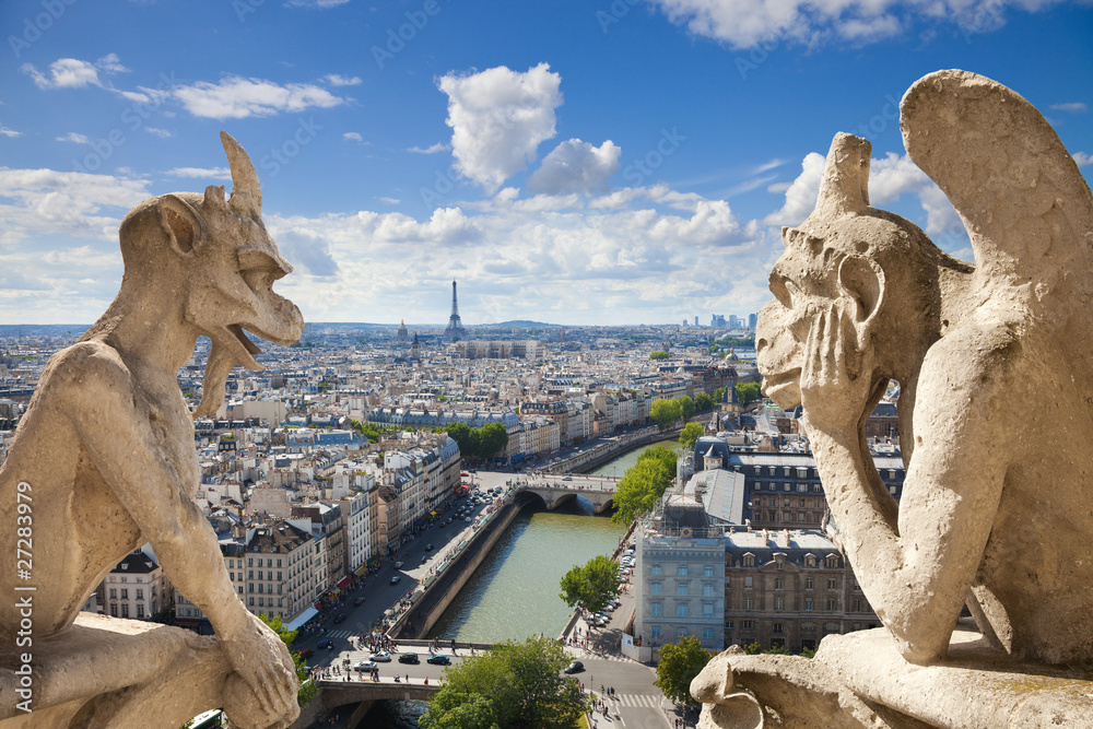 Famous gargoyles of Notre Dame overlooking Paris (compos)