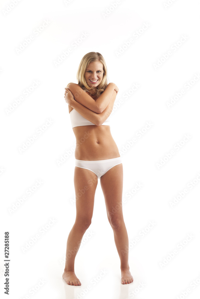 Young woman standing and wearing underwear Young woman standing and wearing underwear