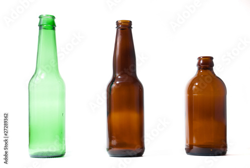 Cuadro en lienzo Three emplty beer bottles on isolated backround.