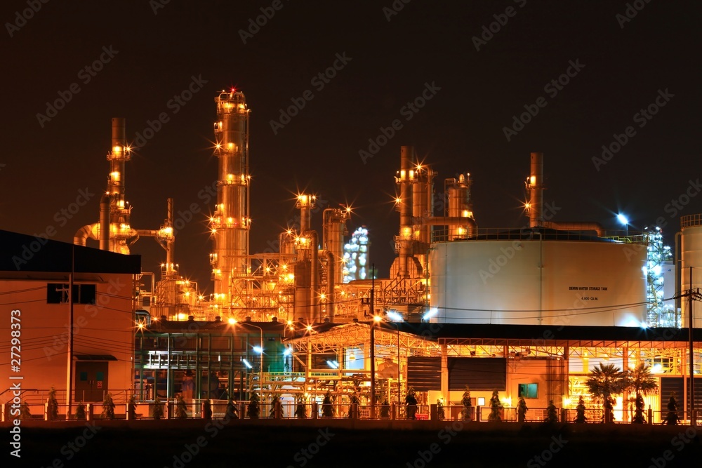 Fototapeta premium petrochemical oil refinery plant and water storage tank