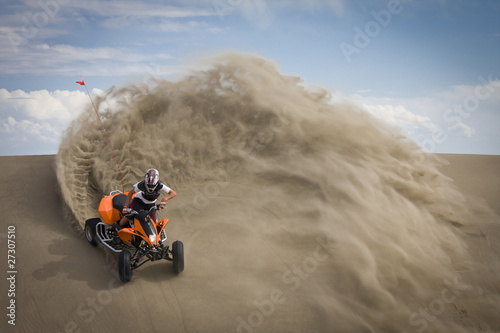 Fototapeta Naklejka Na Ścianę i Meble -  Quad rider in sand dunes roost