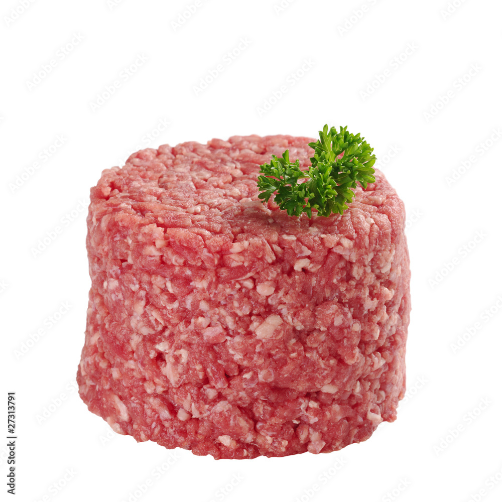 Ground meat with parsley on top isolated on white Ground meat with parsley on top isolated on white