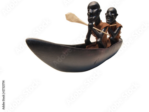 african sculpture - men in canoe