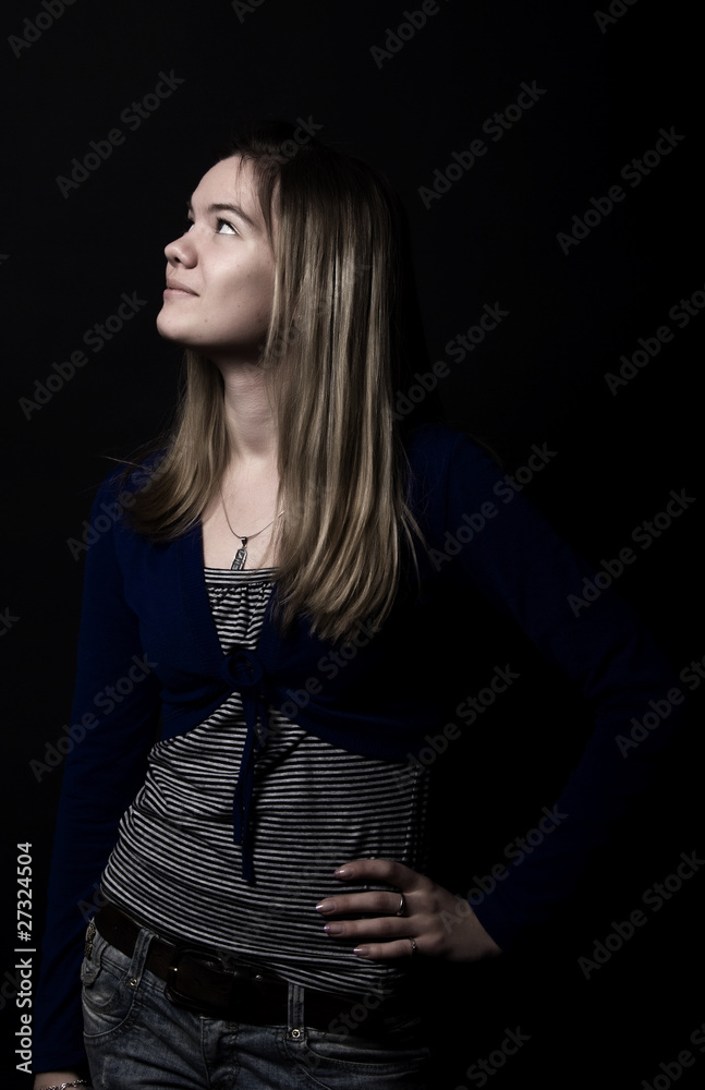Portrait of a young girl looking somewhere