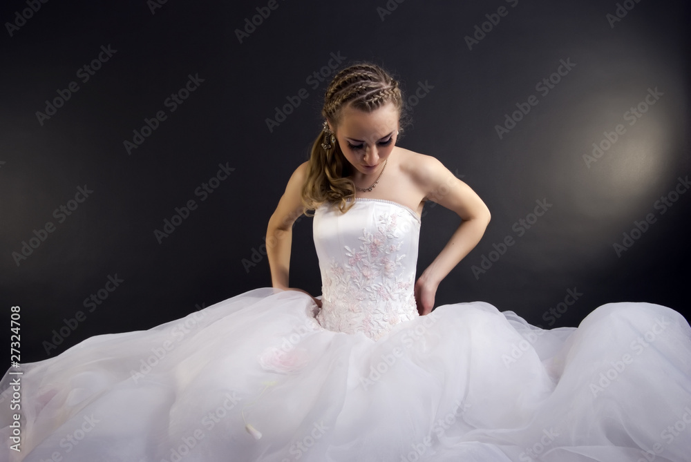 Fototapeta premium Beautiful bride isolated on black