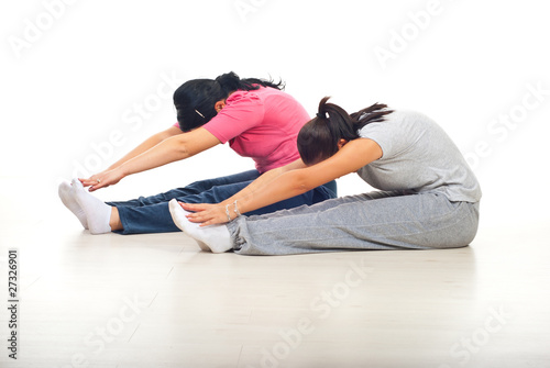 Women  stretching legs and arms at gym © Gabriel Blaj