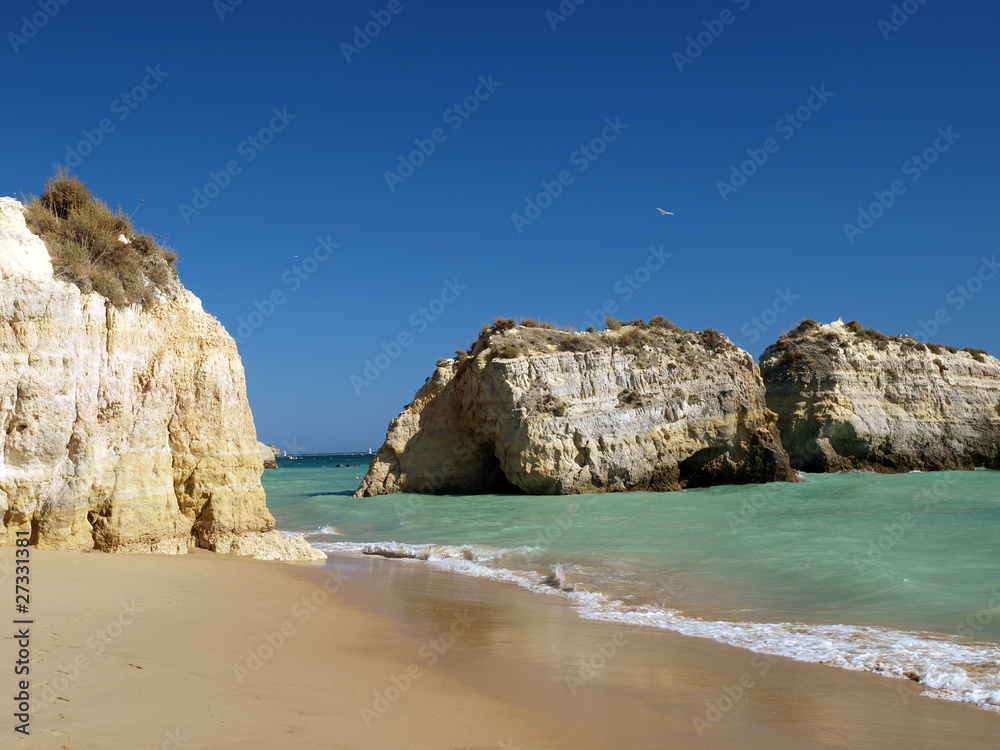 the idyllic Praia de Rocha beach on  coast of the Algarve