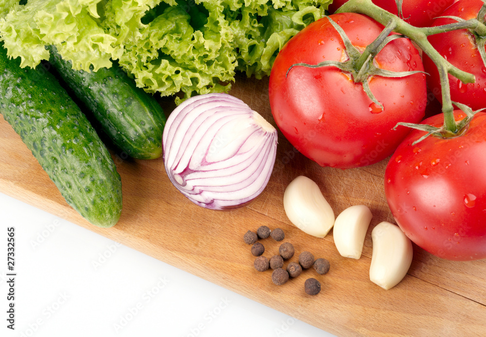 Fresh vegetables on wooden hardboard