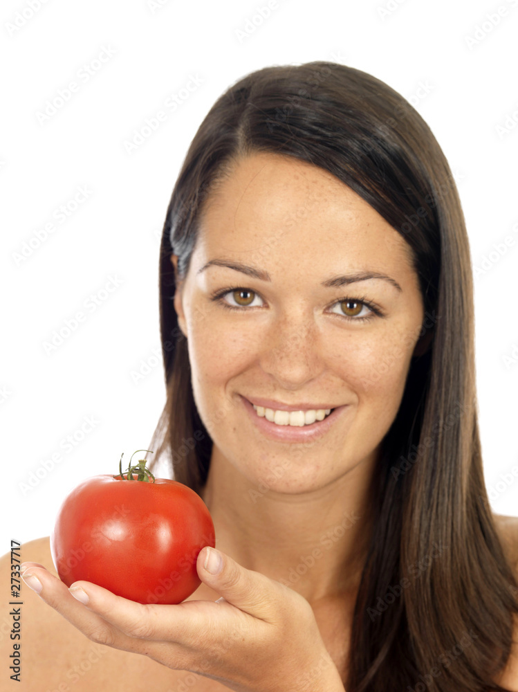 Young Woman Holding Beef Tomato. Model Released Young Woman Holding Beef Tomato. Model Released
