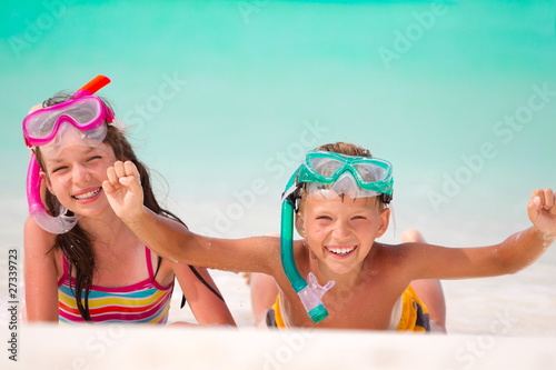 Happy children with snorkels