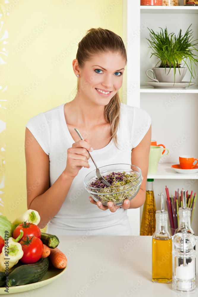 Beauty, young girl holding a bowl of salad Beauty, young girl holding a bowl of salad