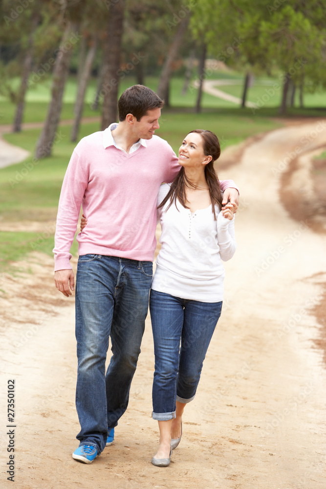 Fototapeta premium Romantic couple enjoying walk in park