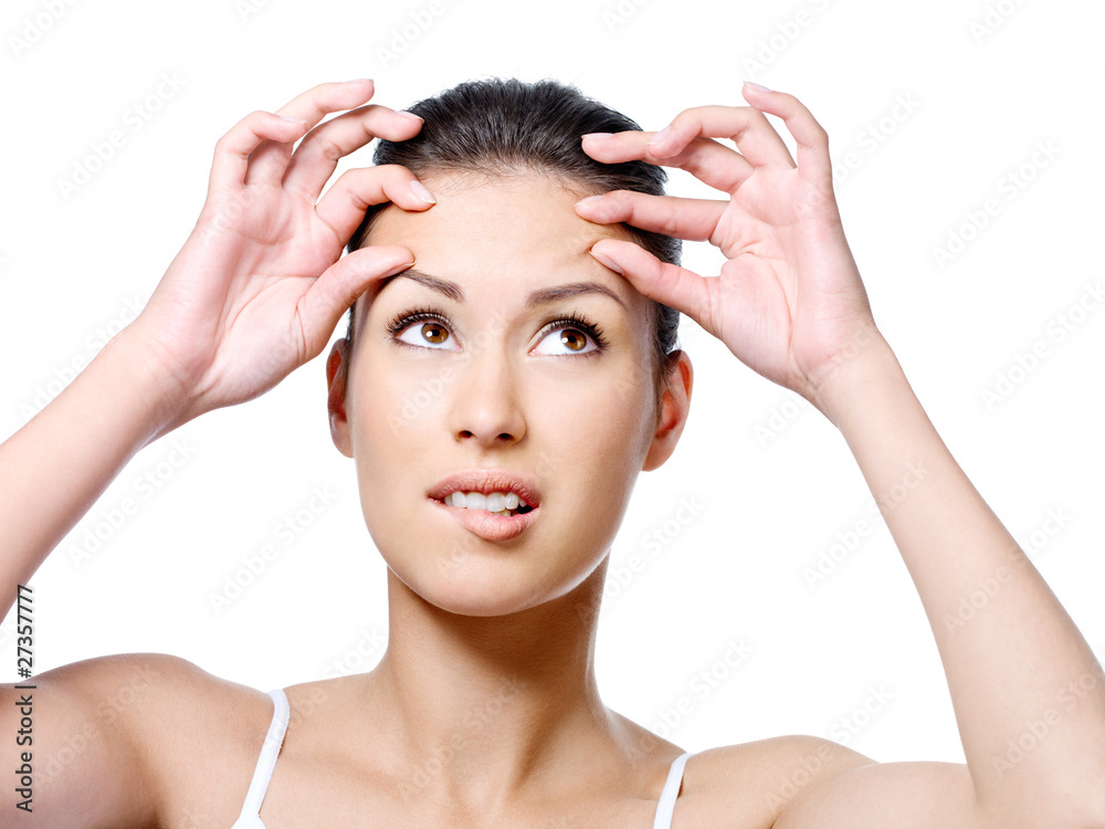 Woman in horror beacause of crease on forehead Woman in horror beacause of crease on forehead