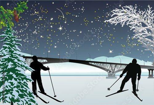 two skiers under night sky