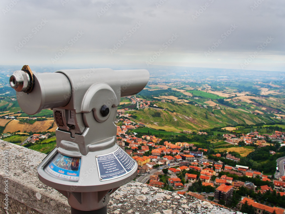 Binocular mounted in San Marino with a view on Italian landscape