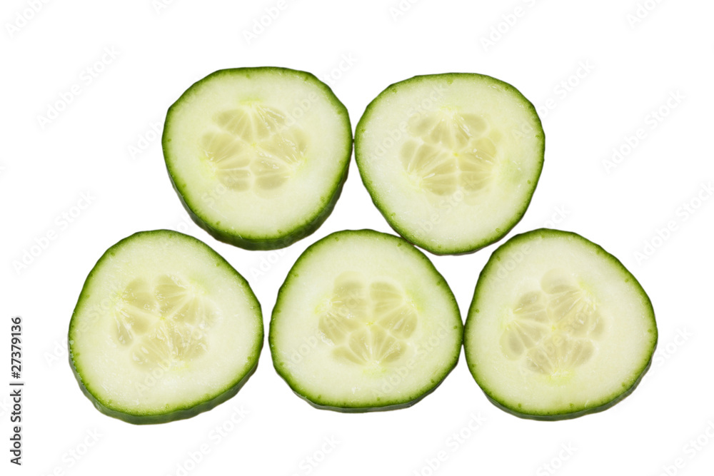 Slices of cucumber isolated on white Slices of cucumber isolated on white