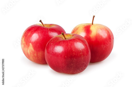 Three red apples isolated on the white
