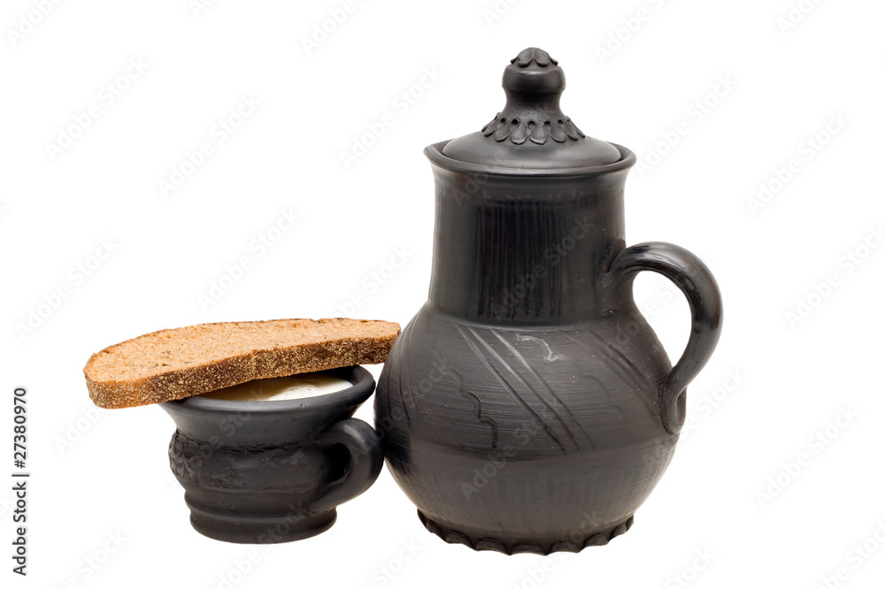 Milk in the Cup, Pitcher and rye bread with caraway Milk in the Cup, Pitcher and rye bread with caraway
