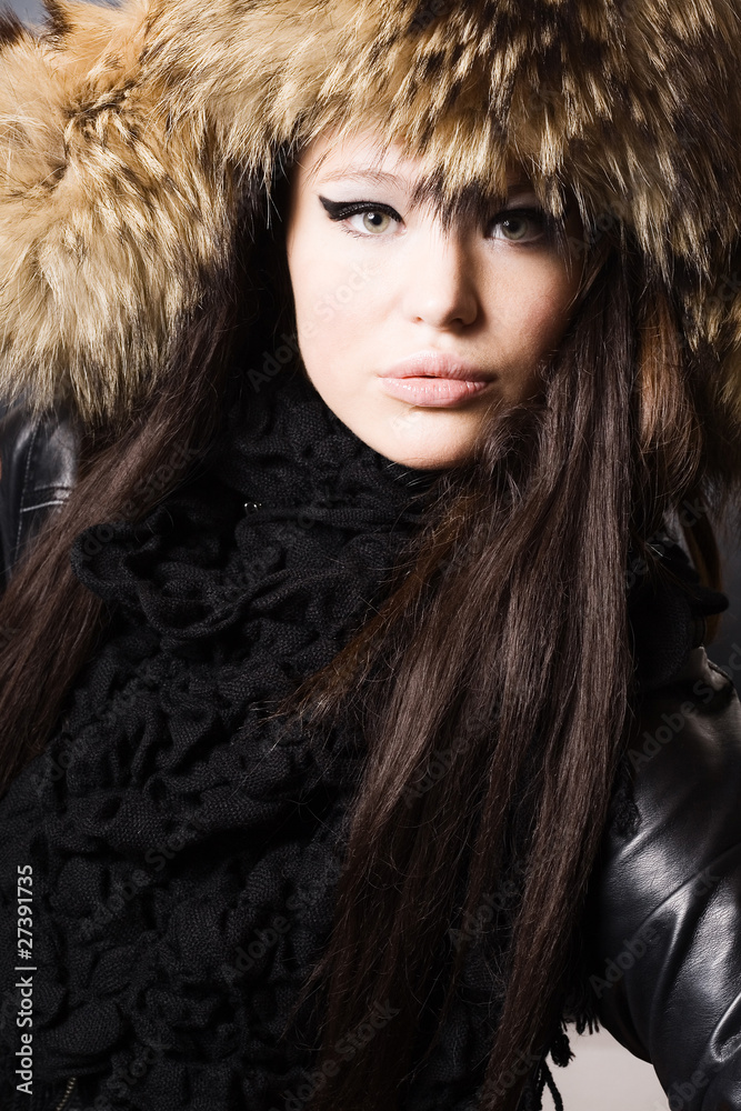 portrait of a beautiful lady in fur cap