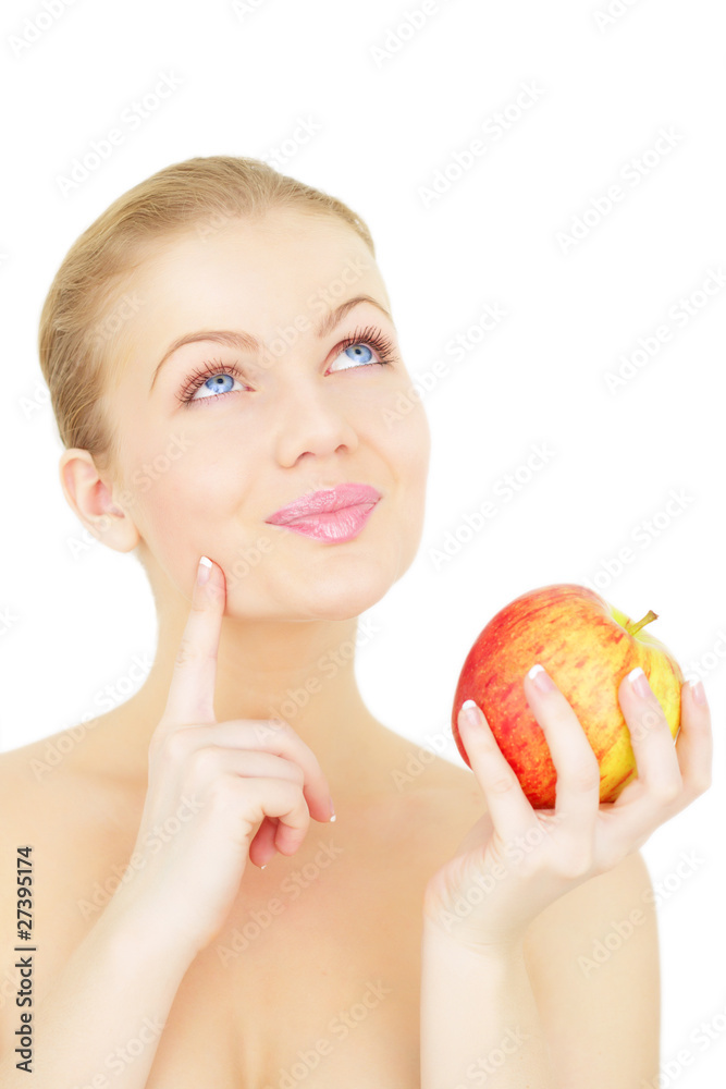 Beautiful girl holding a red apple isolated on a white backgroun Beautiful girl holding a red apple isolated on a white backgroun